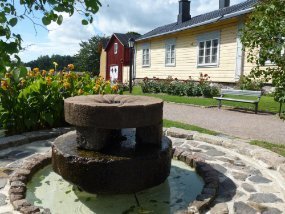 Finland Two grinding stones turned into a water feature